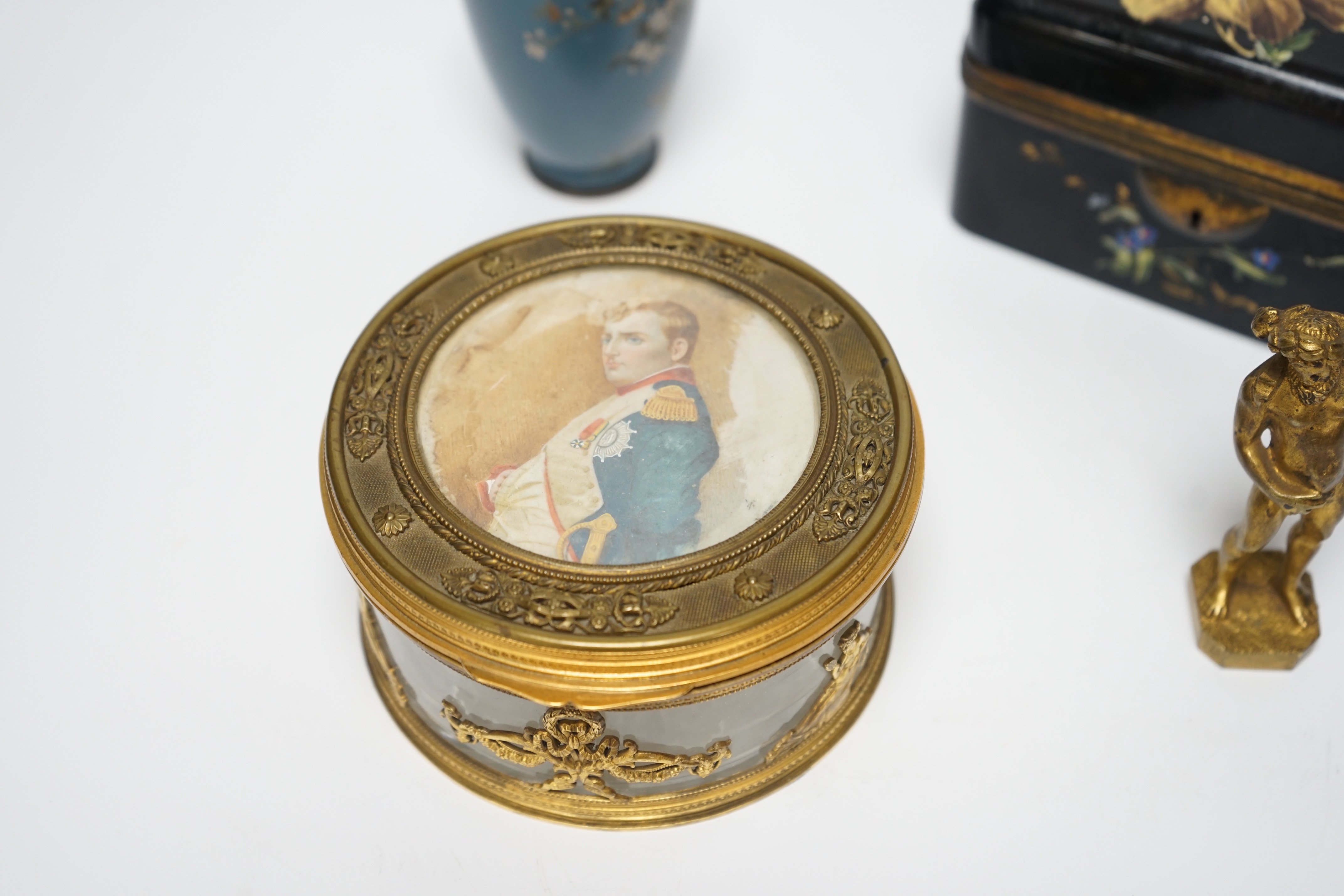 A Palais Royale circular gilt metal cut glass box with an inset portrait miniature of Napoleon on ivorine, 12cm diameter, a Bohemian enamelled glass box attributed to Moser, 12.5cm wide, a Japanese cloisonné enamel vase